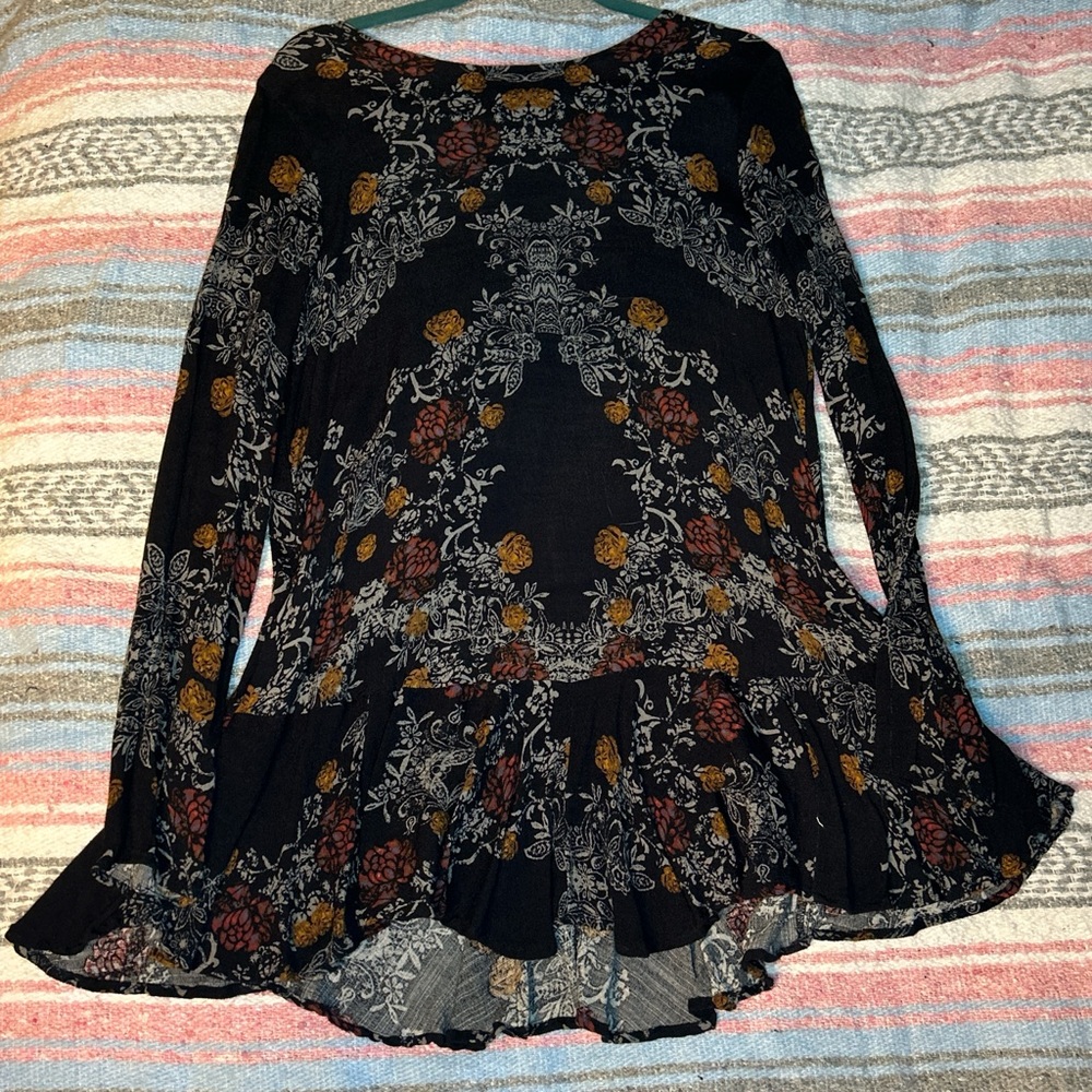 Free People Open Back Mini Dress with Long Sleeves and Floral Design